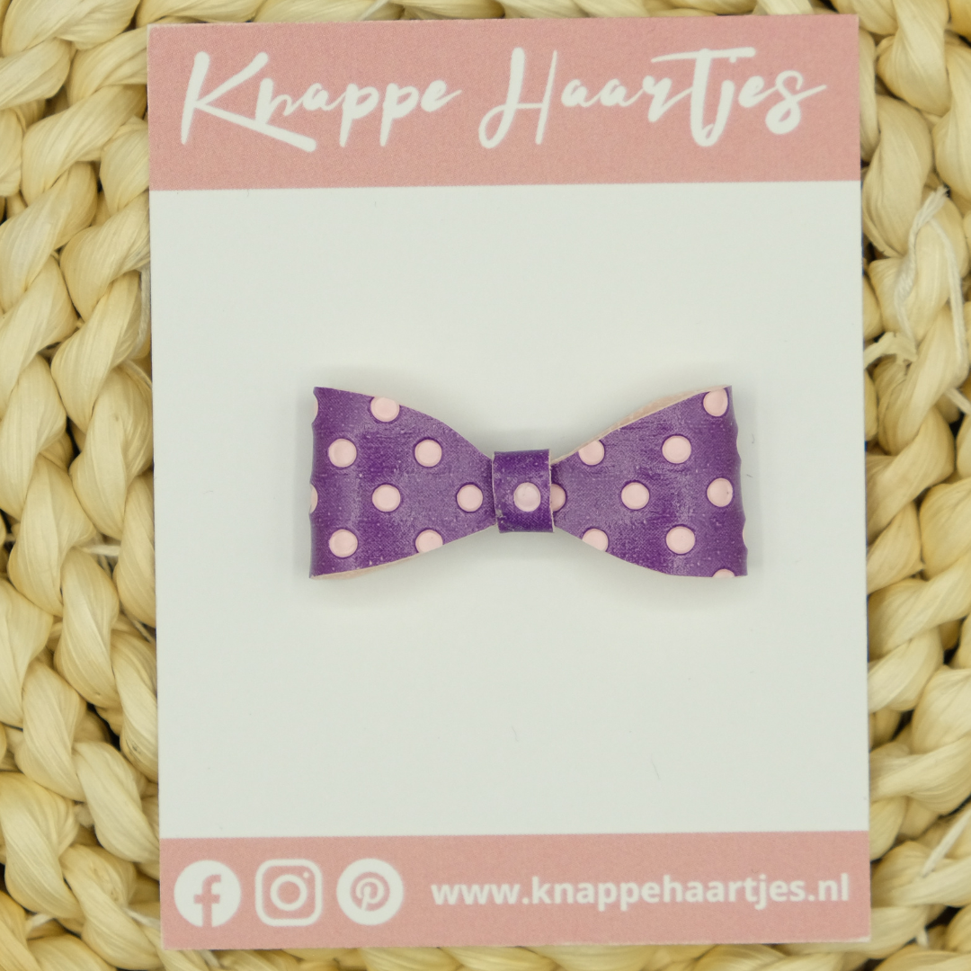 Haarstrikje paars met witte stippen