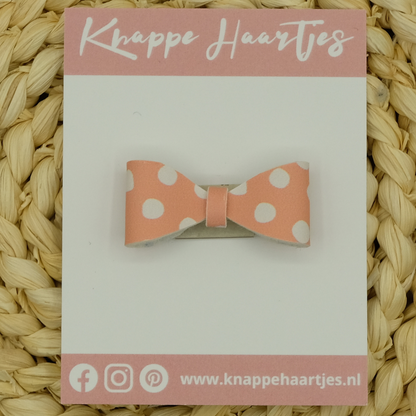 Haarstrikje zalm roze met witte stippen